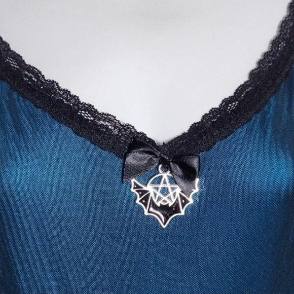 Chic Asymmetrical Teal Dress with Black Trim - Picture 3 of 9